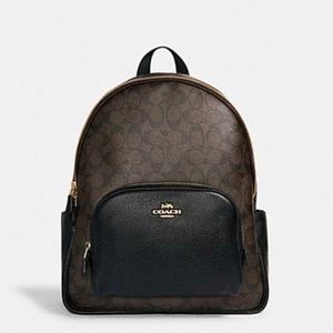 I am selling a coach book bag was a gift only used once and in great condition